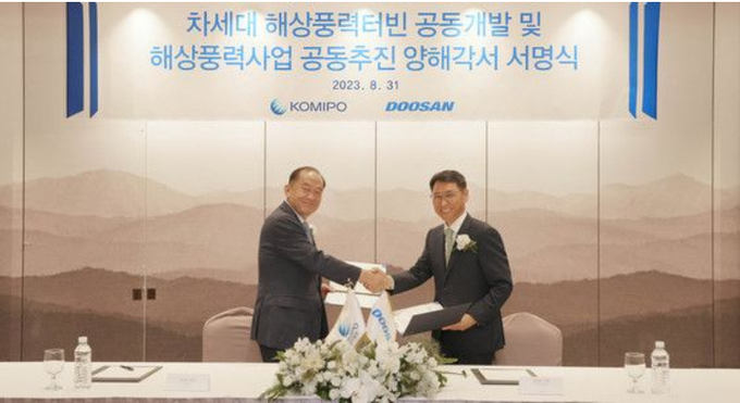 31일 앰배서더 서울 풀만 호텔에서 진행된 업무협약 서명식에서 김호빈 한국중부발전 사장(왼쪽)과 정연인 두산에너빌리티 사장이 기념촬영을 하고 있다(사진=두산에너빌리티)